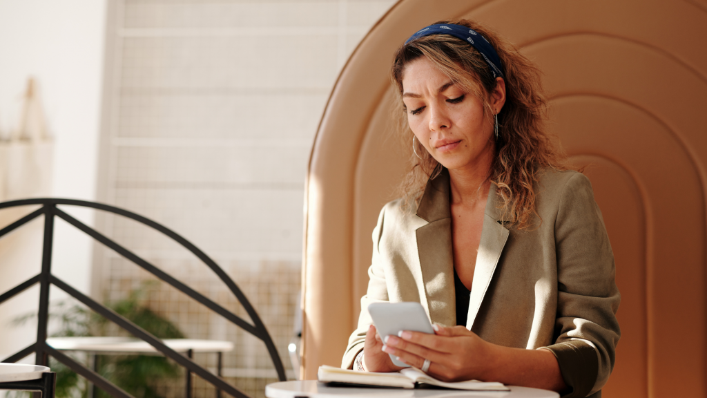 woman looking at phone